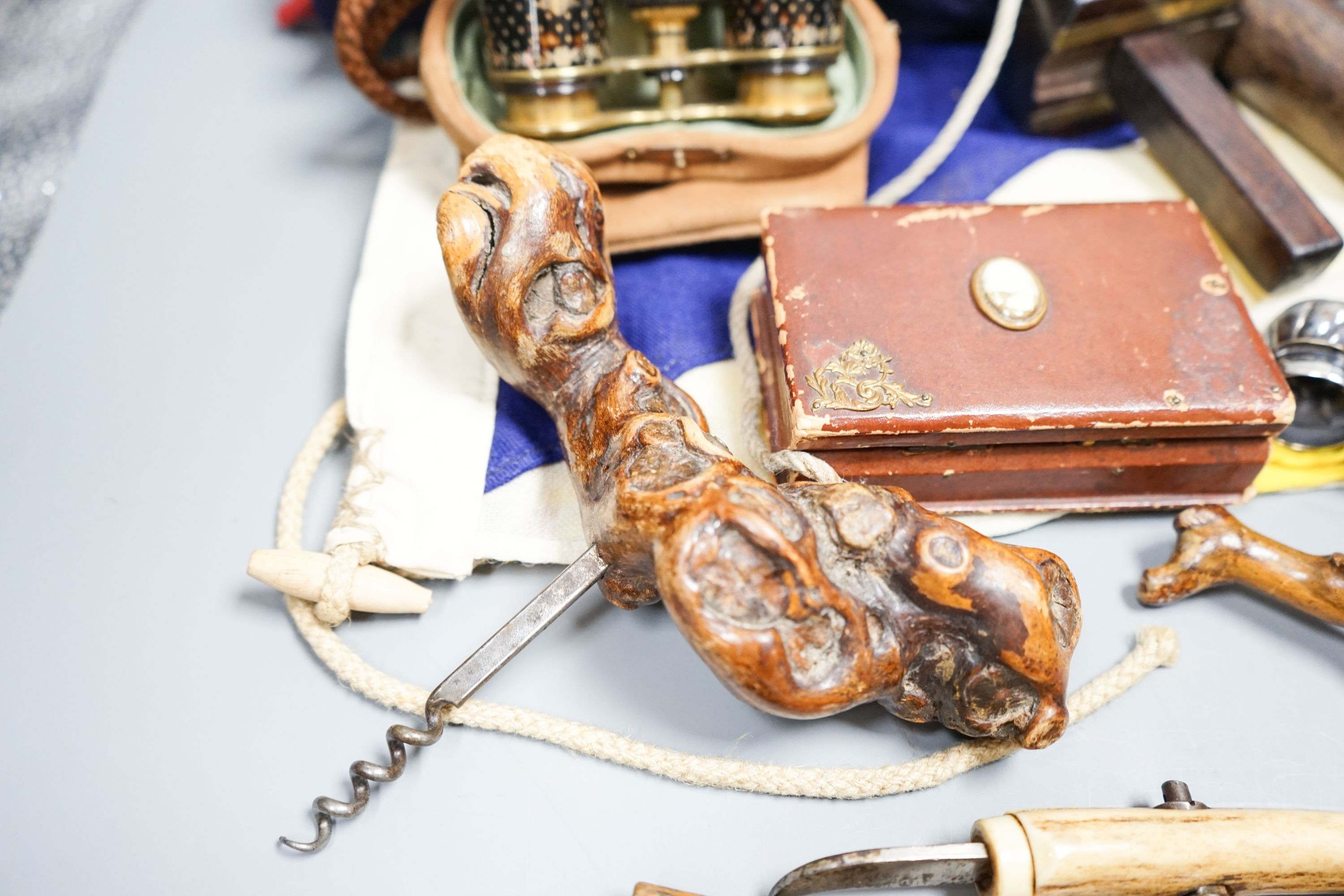 A carpenter's gauge stamped 'J. Waters', two rootwood-handled corkscrews, a Swiss clasp knife and sundry items